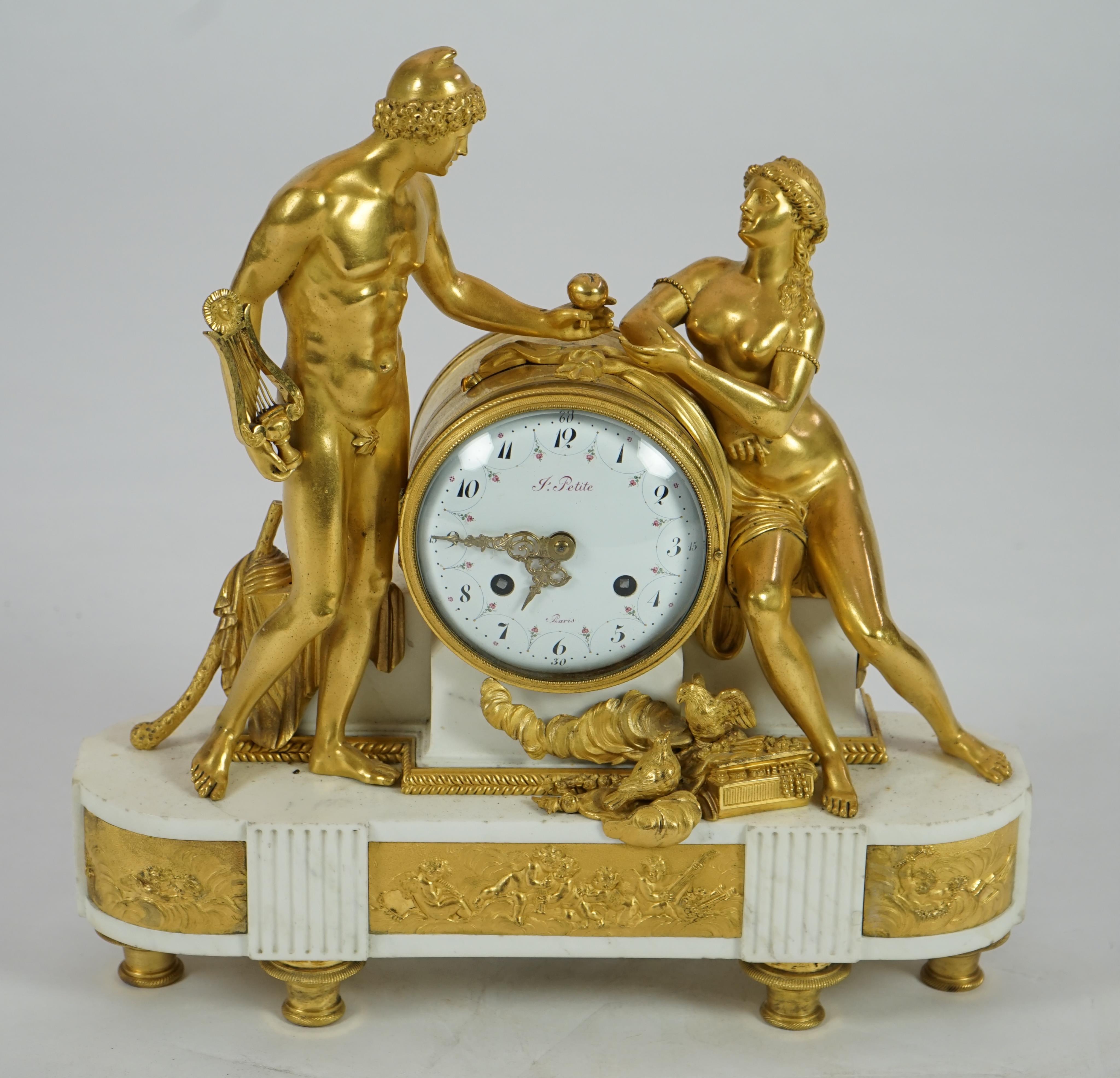 J. Petite of Paris. A 19th century French ormolu and white marble eight day mantel clock